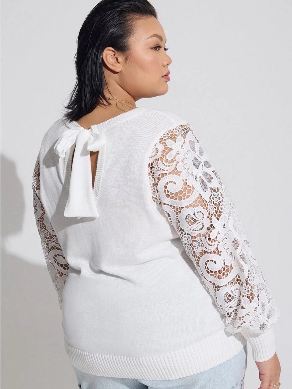 torrid White Lace-Sleeve Crewneck Sweater keyhole back with satin bow. Holiday